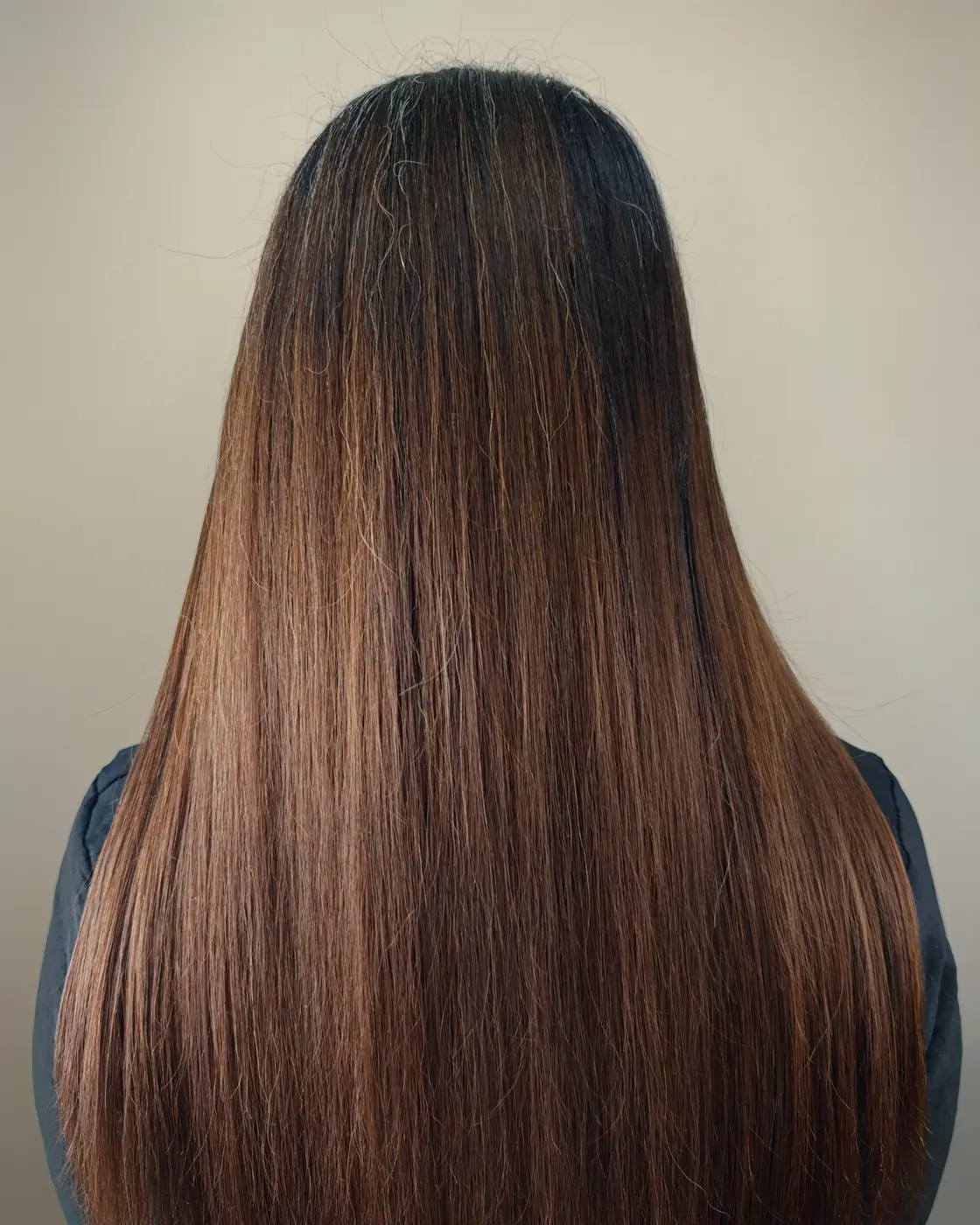 The same hair after restoration: smooth, full length, nothing cut