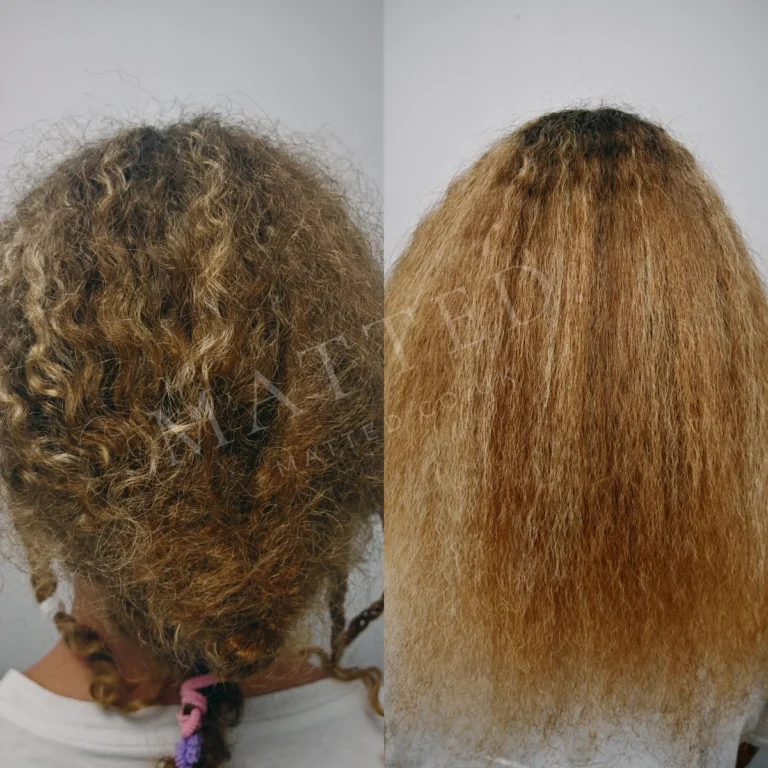 Curly hair that had matted into accidental dreadlocks, taken apart strand by strand